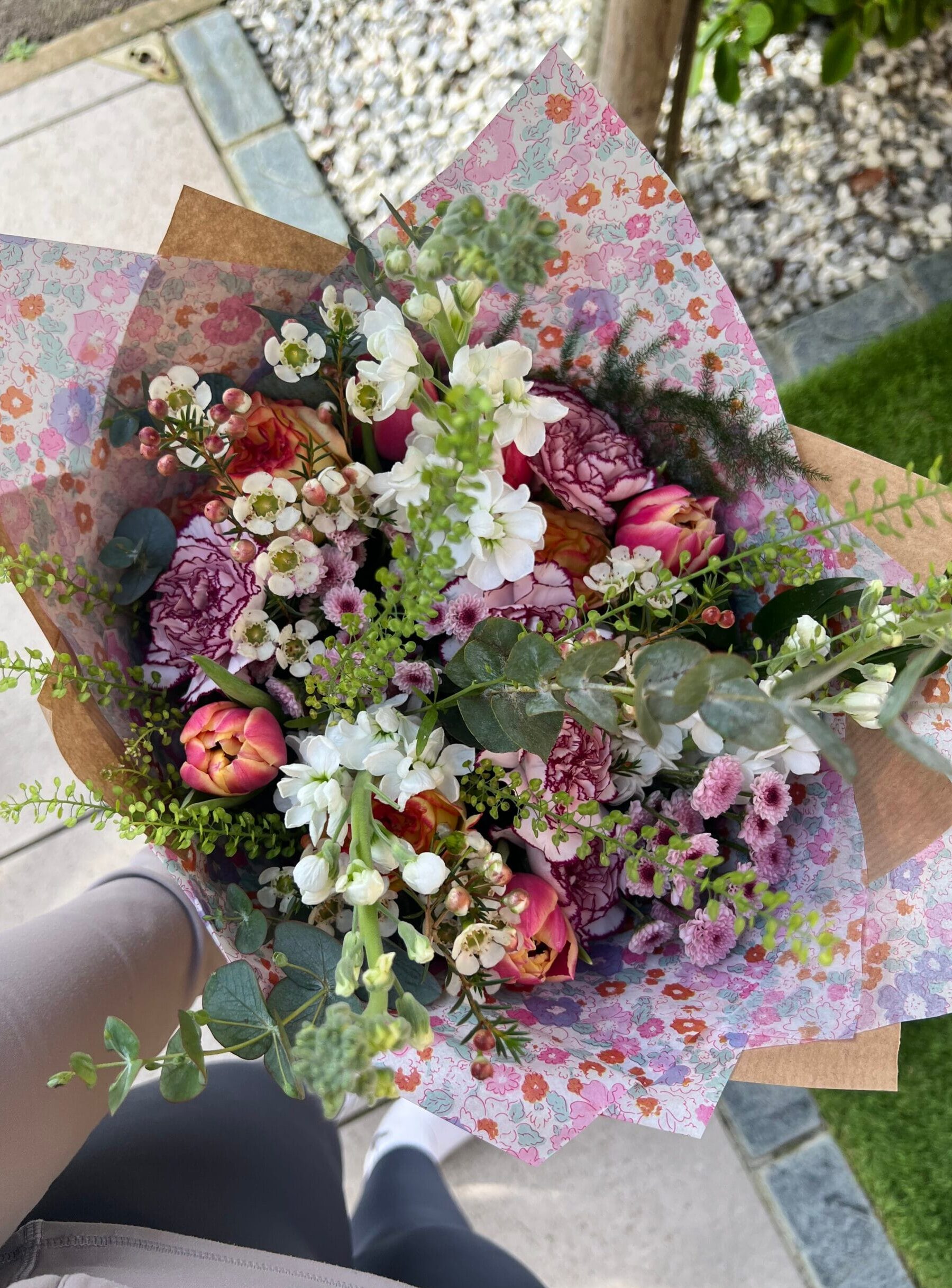 Colourful flower bouquet with wrapping paper design.