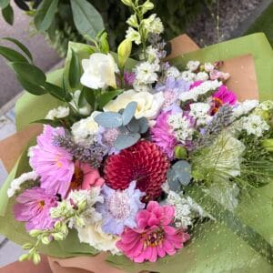 Colourful mixed bouquet with dahlias and roses